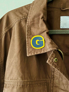 Homecoming “G” Pin Button