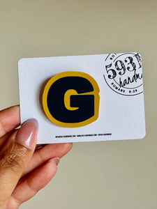 Homecoming “G” Pin Button